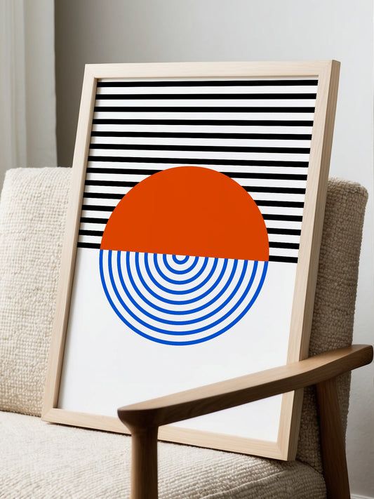 Geometric abstract wall art featuring split circle with orange top and blue, displayed in modern living room setting