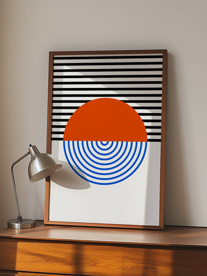 Geometric abstract wall art featuring split circle with orange top and blue, displayed in modern living room setting