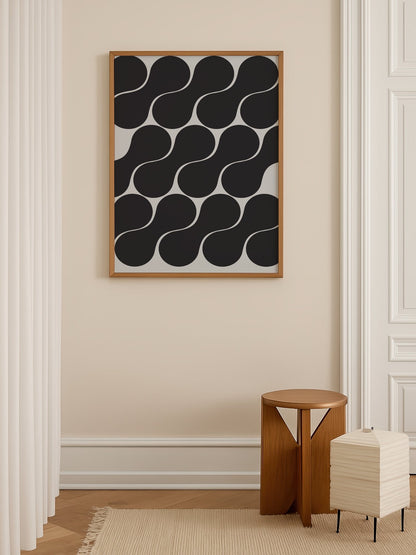 Geometric wall art print featuring interlocking black circles in grid pattern, shown in minimalist home office space