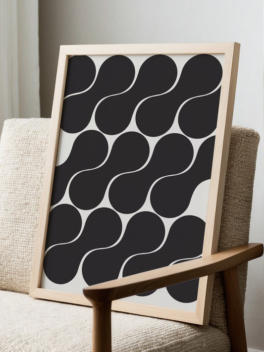 Geometric wall art print featuring interlocking black circles in grid pattern, displayed in modern living room setting