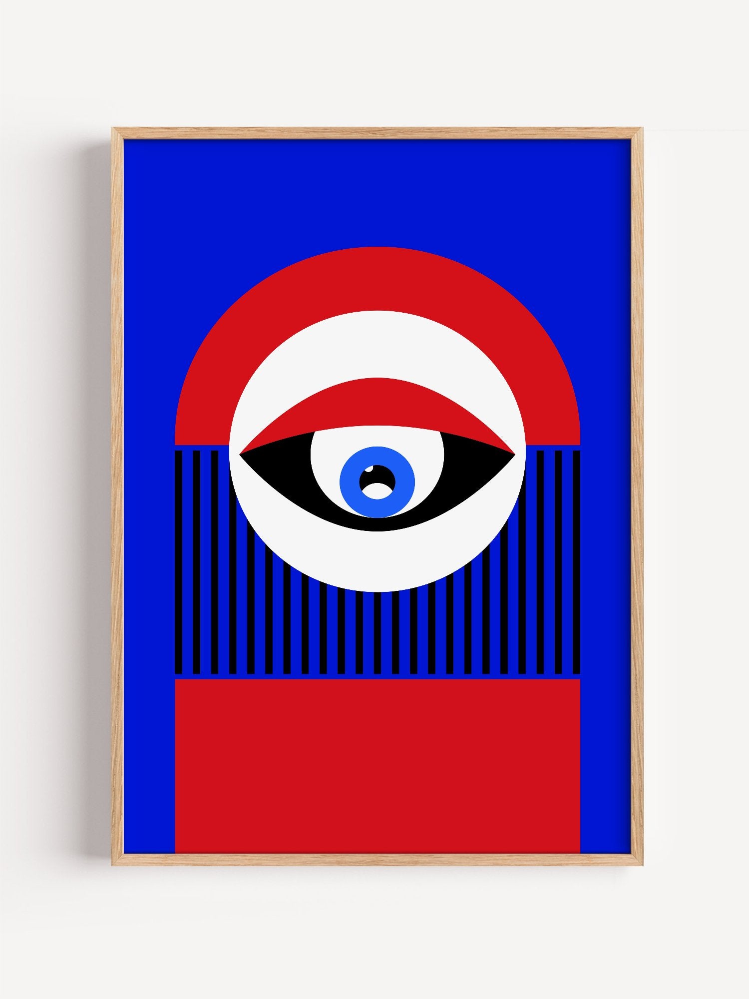 Abstract geometric portrait art with bold central eye motif in cobalt blue, close-up showing print texture and color detail