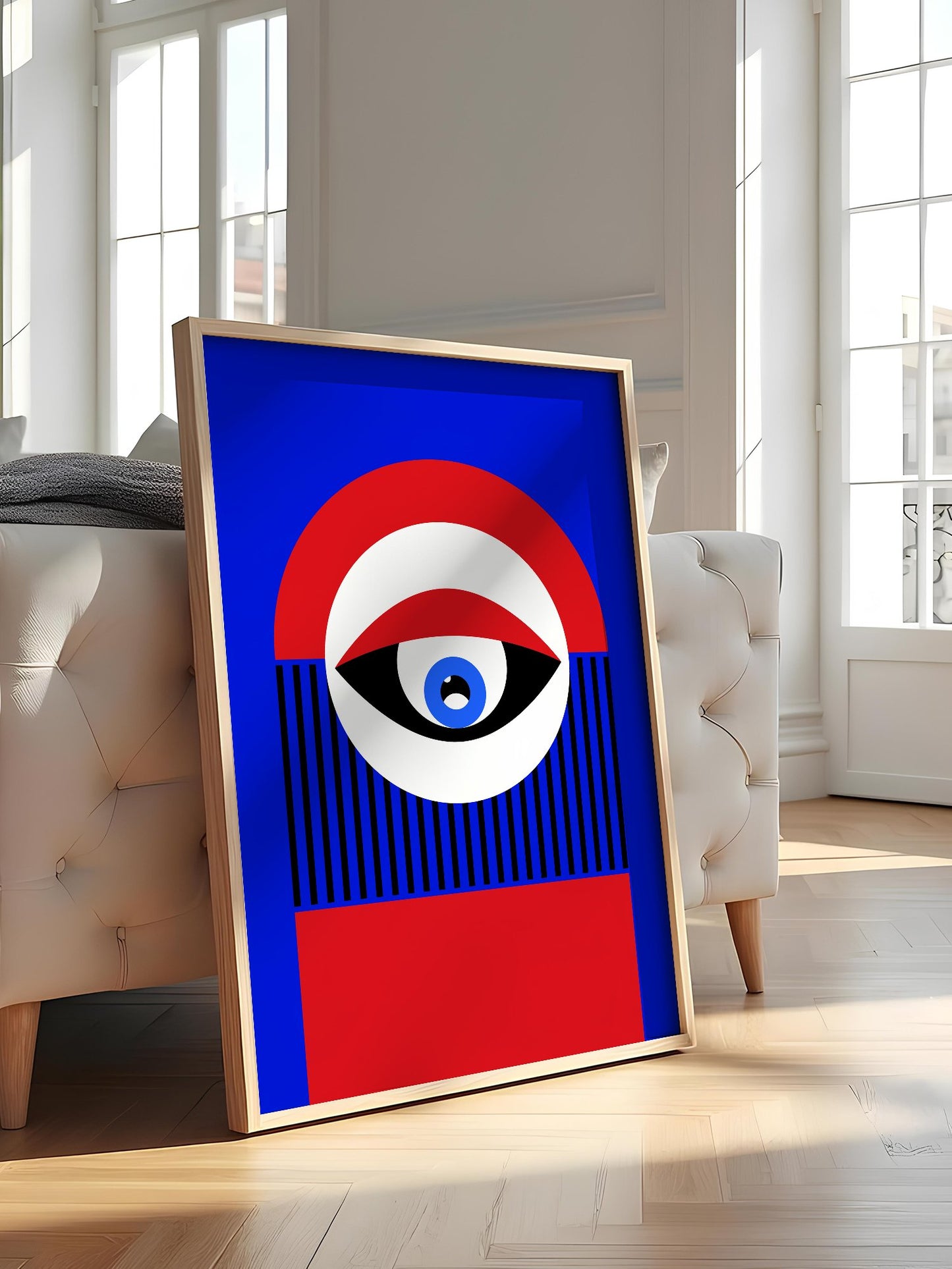 Abstract geometric portrait art with bold central eye motif in cobalt blue, featured in stylish apartment decor