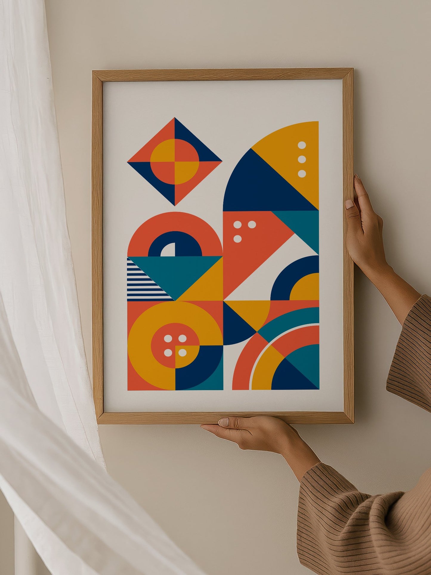 Geometric abstract wall art with interlocking shapes in coral red, navy blue, hanging in contemporary bedroom interior