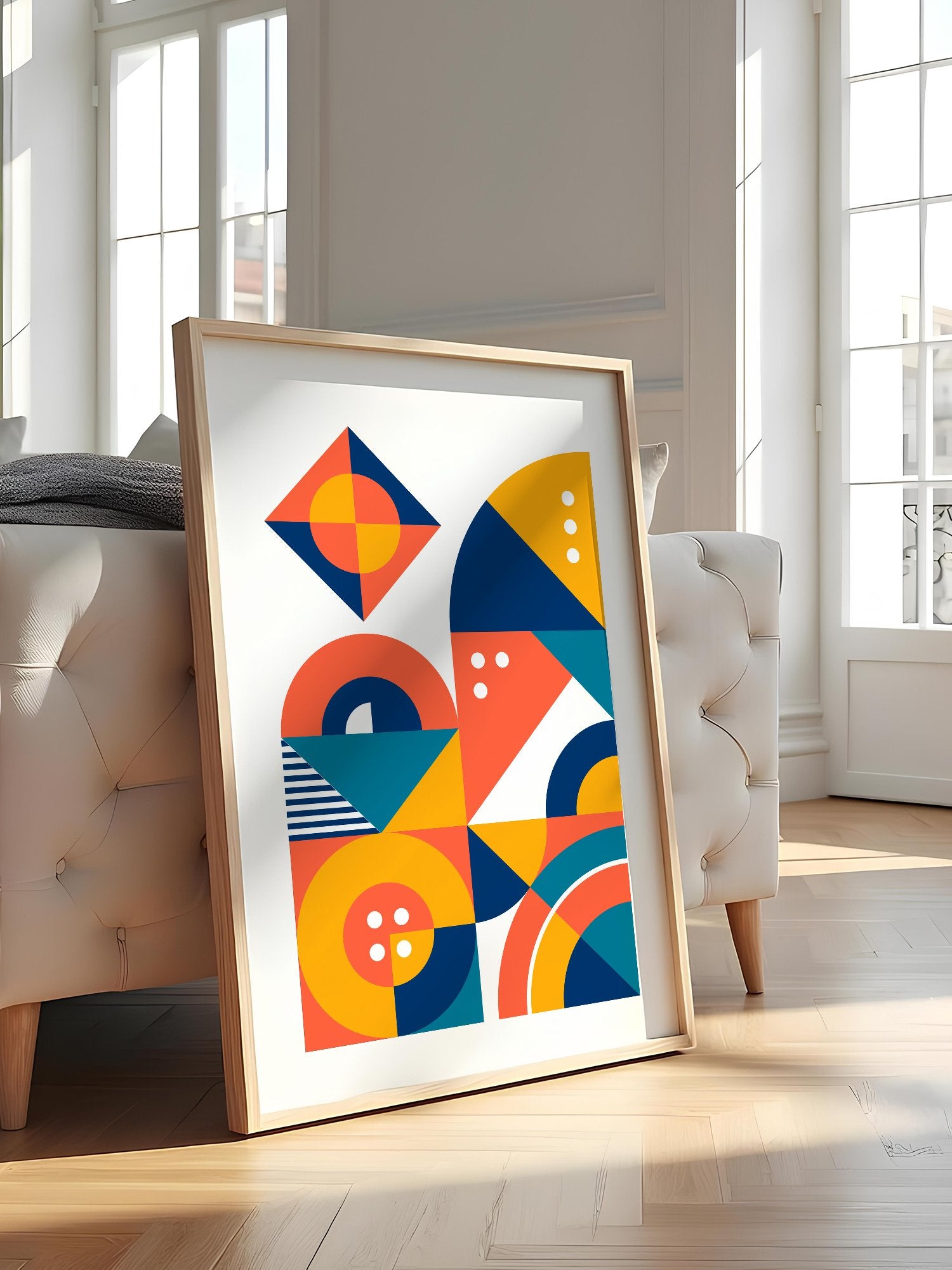 Geometric abstract wall art with interlocking shapes in coral red, navy blue, featured in stylish apartment decor
