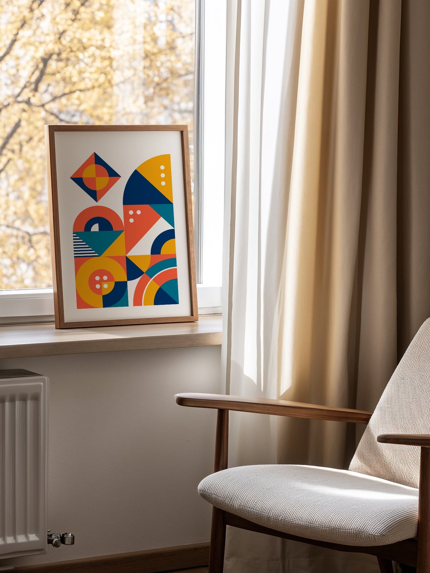 Geometric abstract wall art with interlocking shapes in coral red, navy blue, mounted in bright gallery wall arrangement