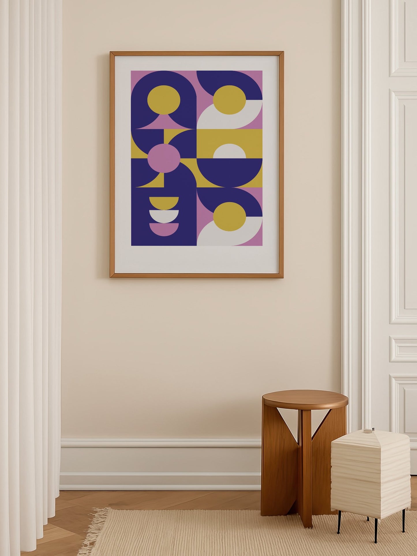 Geometric abstract wall art with navy blue curved shapes, golden yellow, shown in minimalist home office space