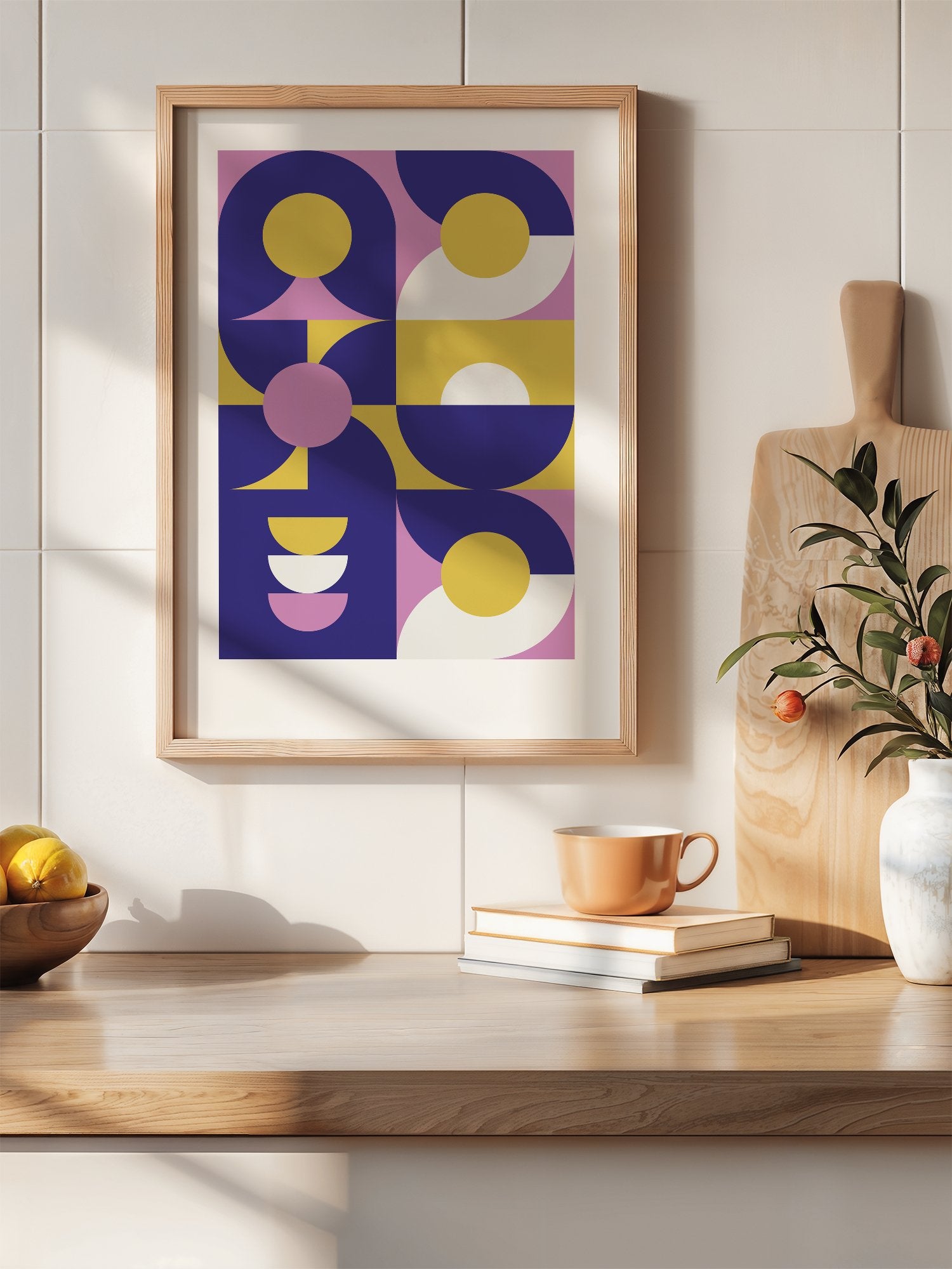 Geometric abstract wall art with navy blue curved shapes, golden yellow, hanging in contemporary bedroom interior