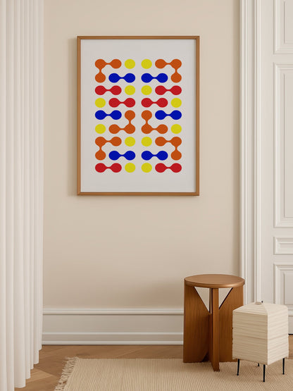 Mid-century modern geometric print with colourful molecular shapes in orange, shown in minimalist home office space