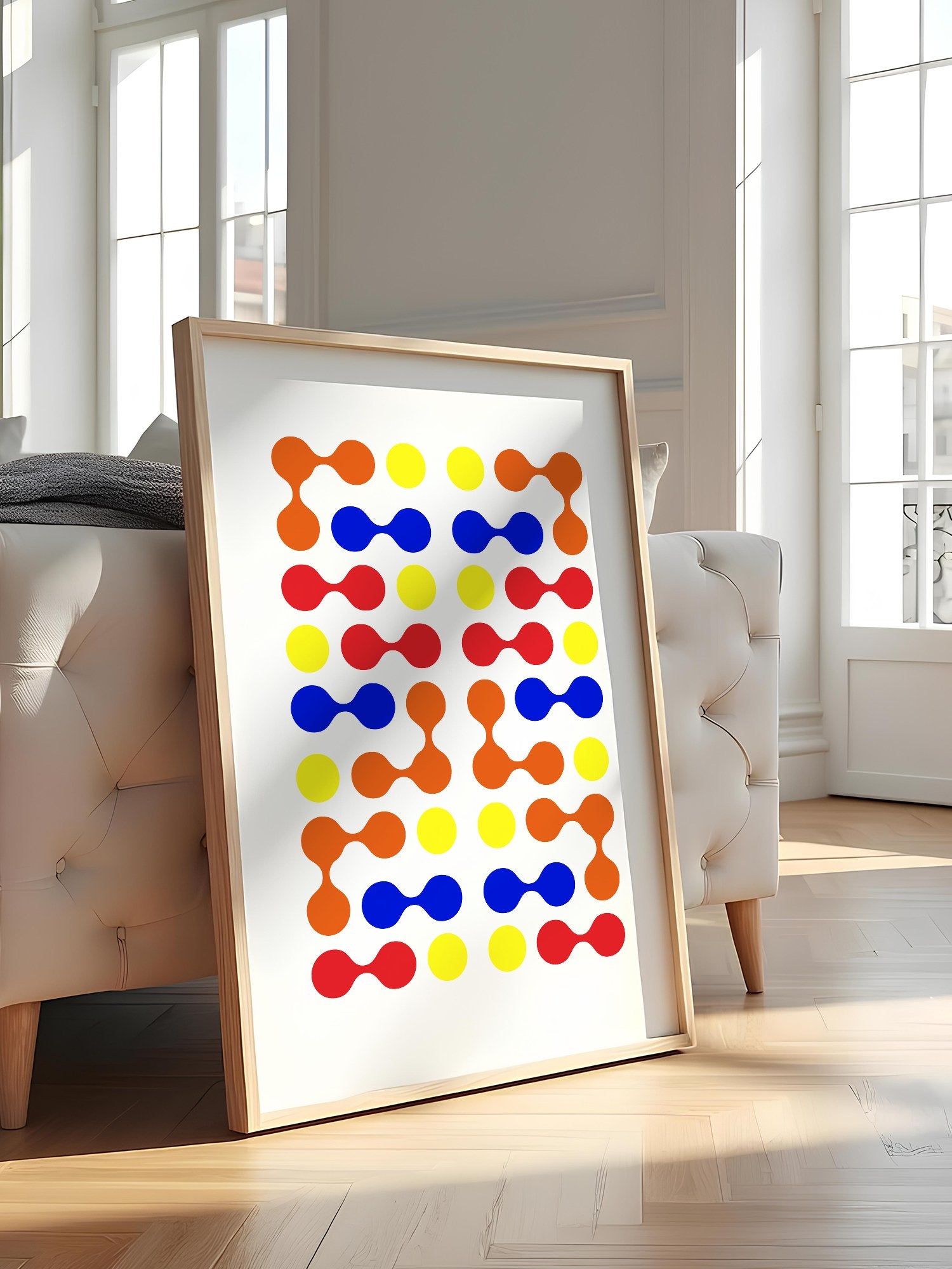 Mid-century modern geometric print with colourful molecular shapes in orange, featured in stylish apartment decor