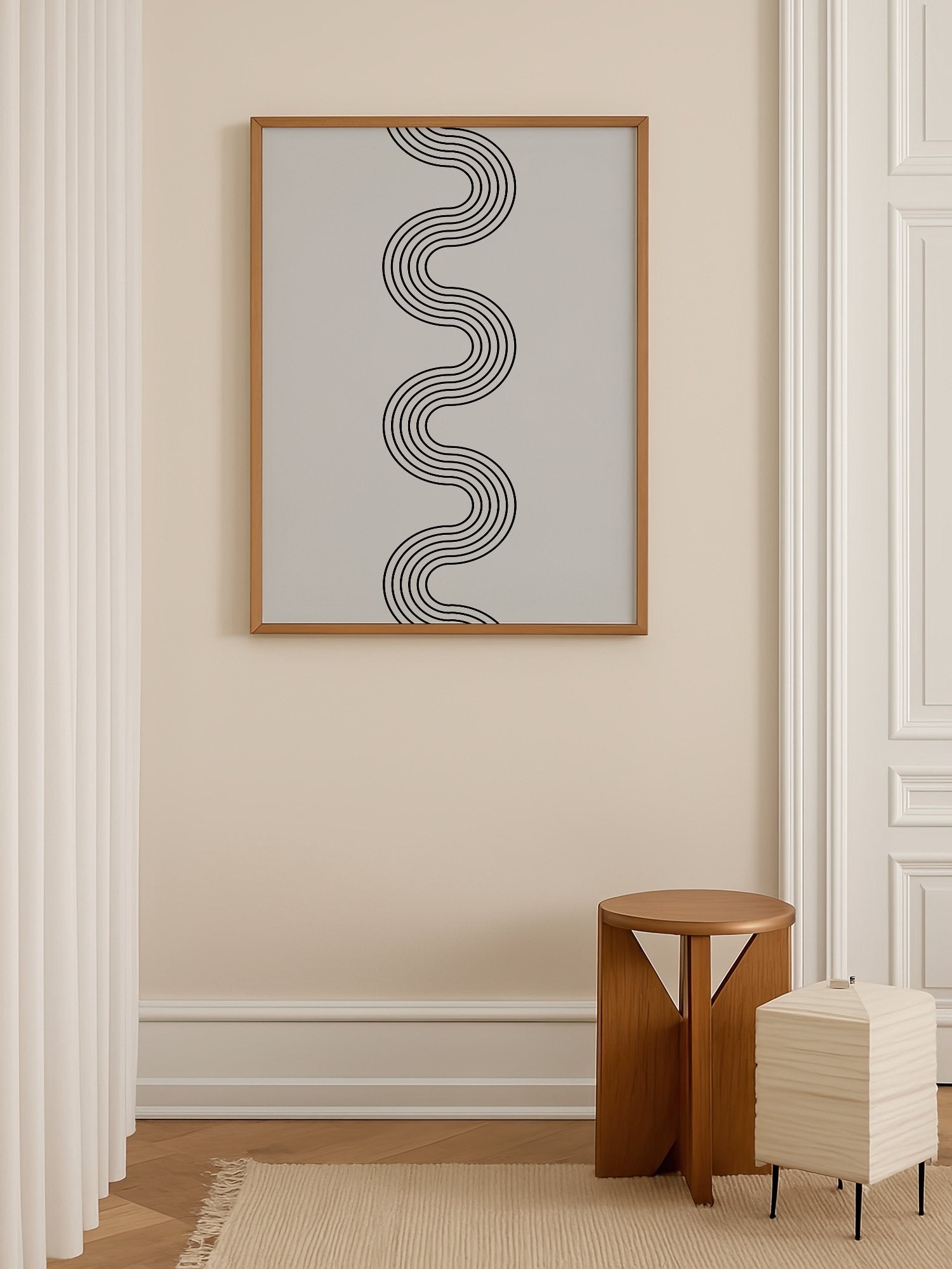 Minimalist abstract wall art with flowing black wave lines creating S-curve, shown in minimalist home office space