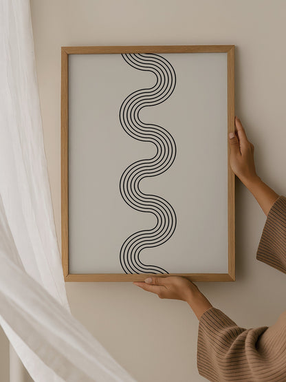 Minimalist abstract wall art with flowing black wave lines creating S-curve, hanging in contemporary bedroom interior