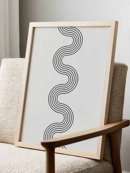 Minimalist abstract wall art with flowing black wave lines creating S-curve, displayed in modern living room setting