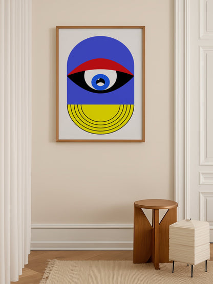 Pop art portrait print featuring geometric eye with concentric circles in blue, shown in minimalist home office space
