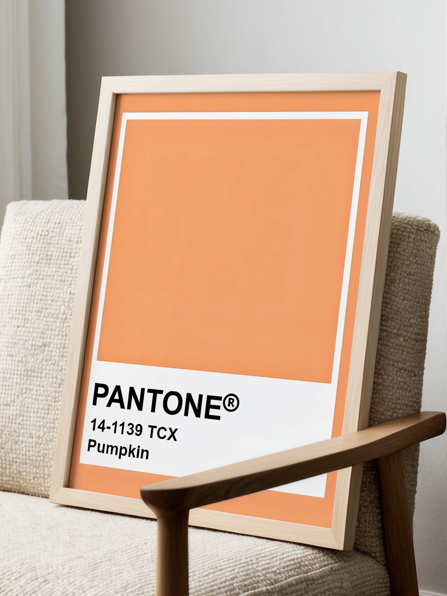Pantone Pumpkin 14-1139 TCX orange wall art print, minimalist graphic poster, displayed in modern living room setting