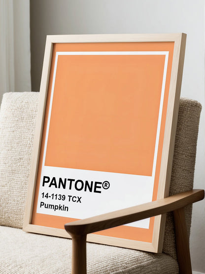 Pantone Pumpkin 14-1139 TCX orange wall art print, minimalist graphic poster, displayed in modern living room setting